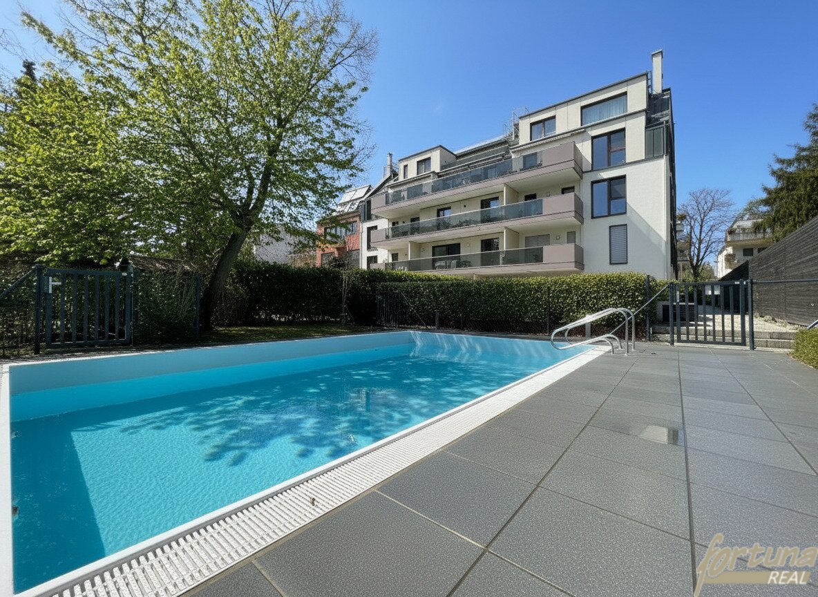 Exklusive 3-Zimmer-Neubauwohnung mit Balkon, Smart-Steuerung, Pool im Garten & Tiefgarage