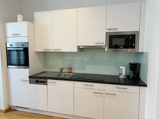 Neuwertige Wohnung in zentraler Lage mit Fußbodenheizung und Küche