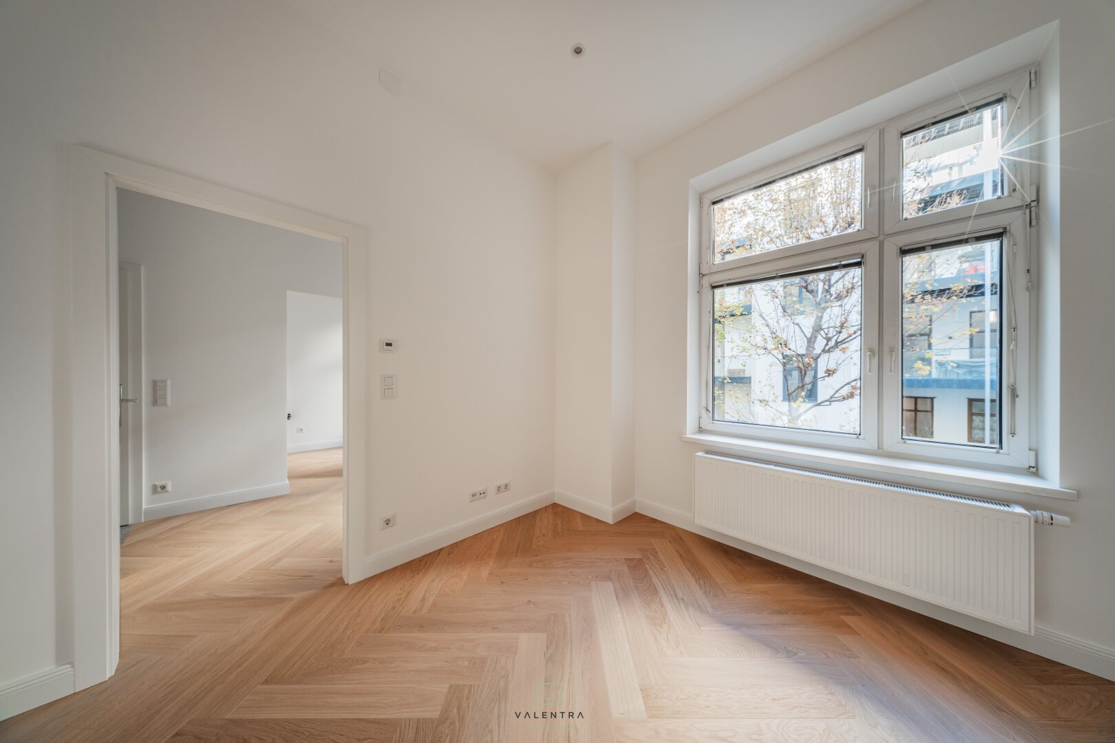 Stilvoll renovierte Neubauwohnung mit Altbau-Charme und Grünblick