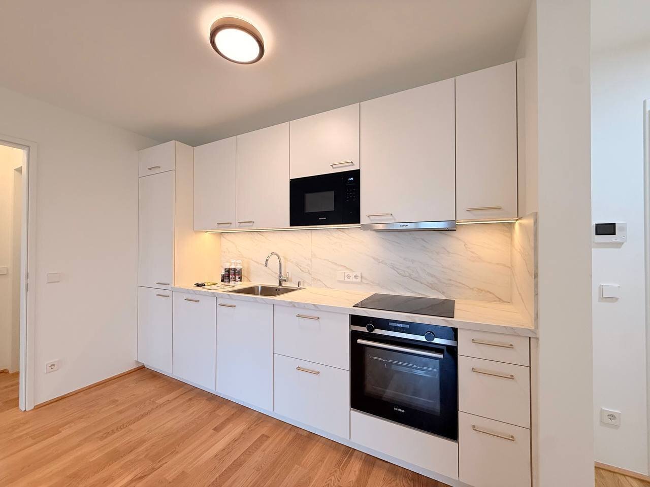 AB SOFORT - PROVISIONSFREI - VILLAGE IM DRITTEN -  ERSTBEZUG - TOP-AUSSTATTUNG - GARAGE