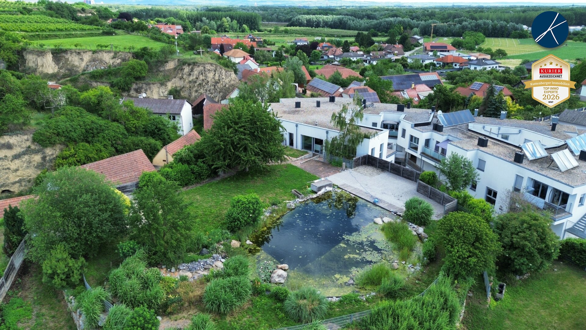 Großzügiges Penthouse mit Garten und Schwimmteich