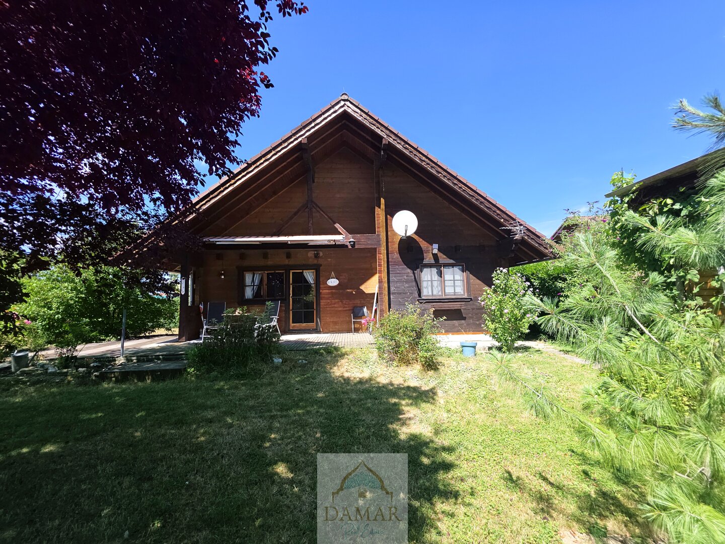 Holzhaus mit Garten & Seezugang – Wohnen, wo andere Urlaub machen!
